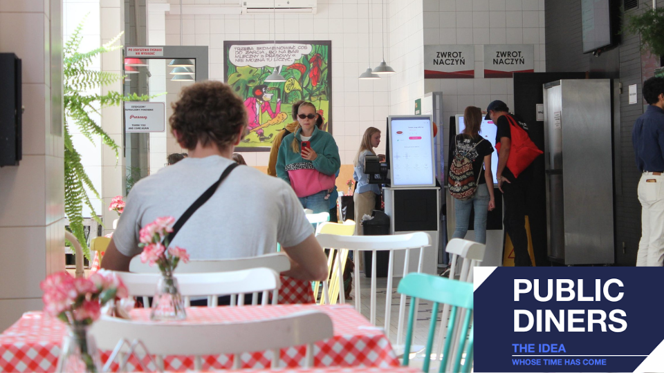 Group of people eating at a cafe.